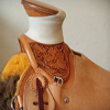 a working wade saddle, 3/8ths tooled with a classic medium Sheridan style flower.